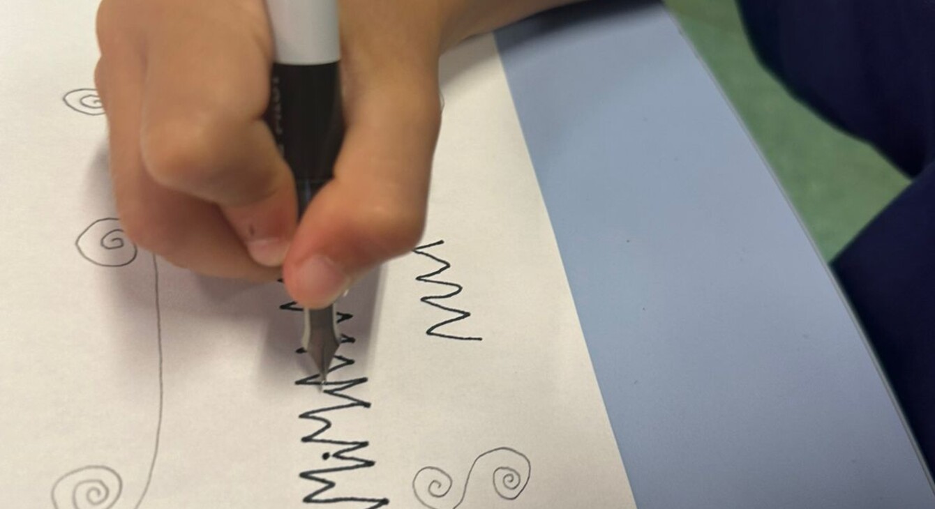 Production d'élève au stylo plume en classe de GS